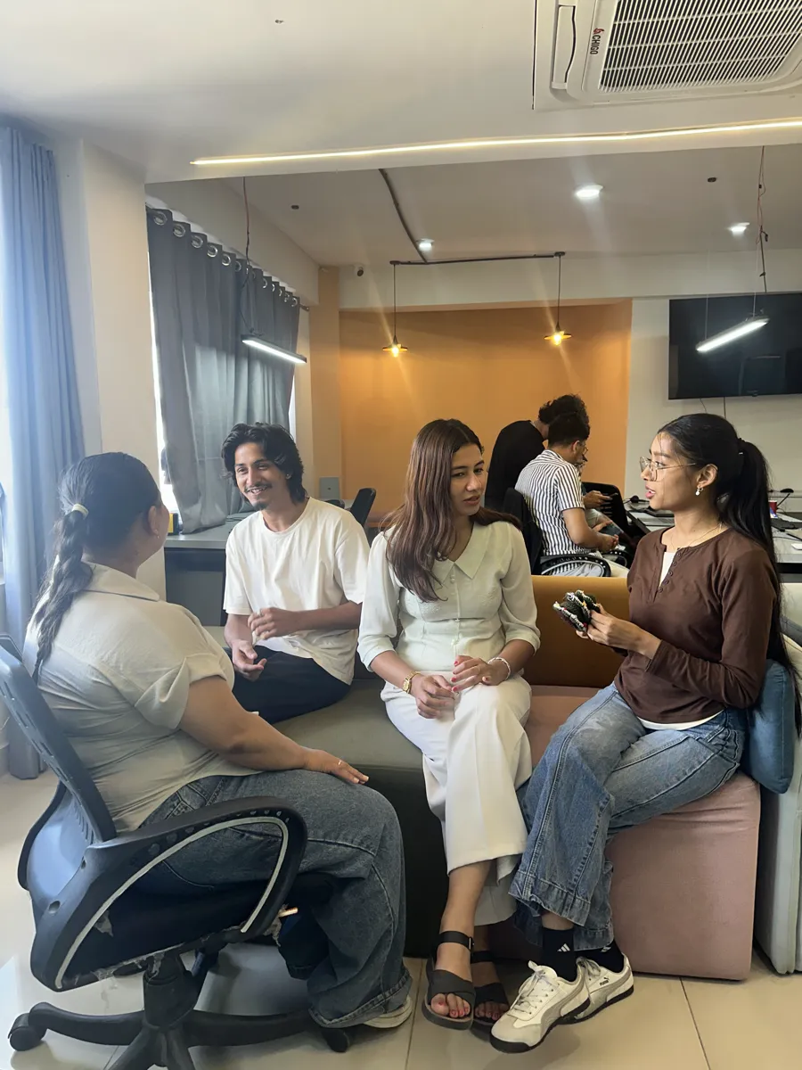 NepalHRM team members catching up in the office lounge in Kathmandu